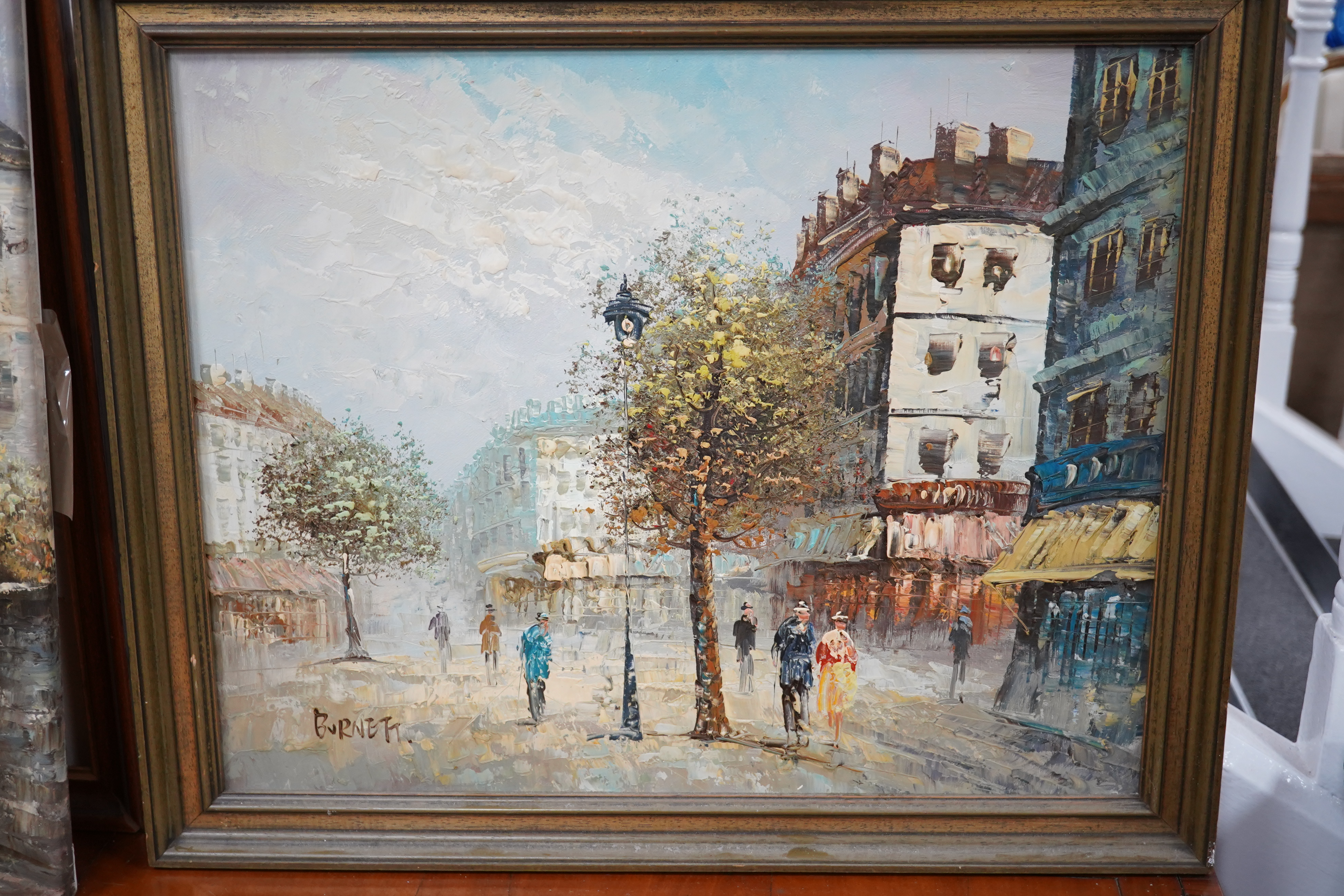 Burnett, two impressionist oils on canvas, Parisian street scenes, each signed, 39 x 49cm. Condition - fair to good, one loose in the frame